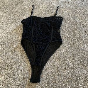 Size small, black, strapping, see through cheetah body suit!